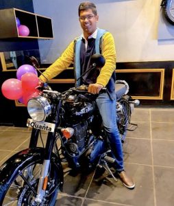 Rishi Mittal with his Royal Enfield gifted by iQuanta's CEO & Founder, Mr. Indrajeet Singh