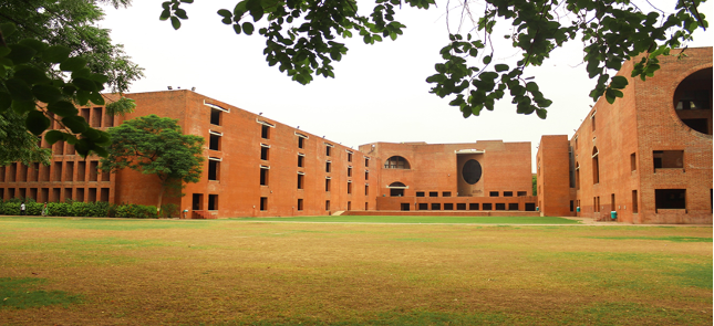 IIM Ahmedabad Campus with tall red building in the background